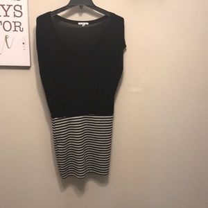 Black top with stripped bottom dress